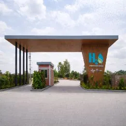 Modern entrance gate of H2O Farms near Berigai, Sarjapur,with landscaped surroundings