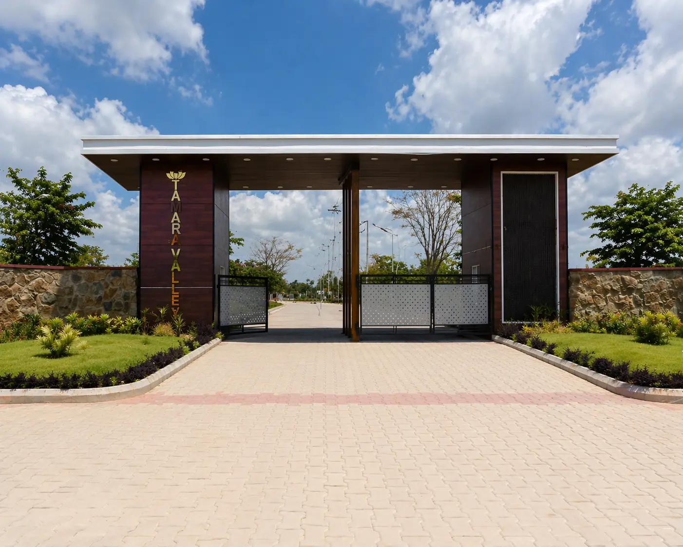 Tamara valley entrance gate with lush greenery and scenic landscape views